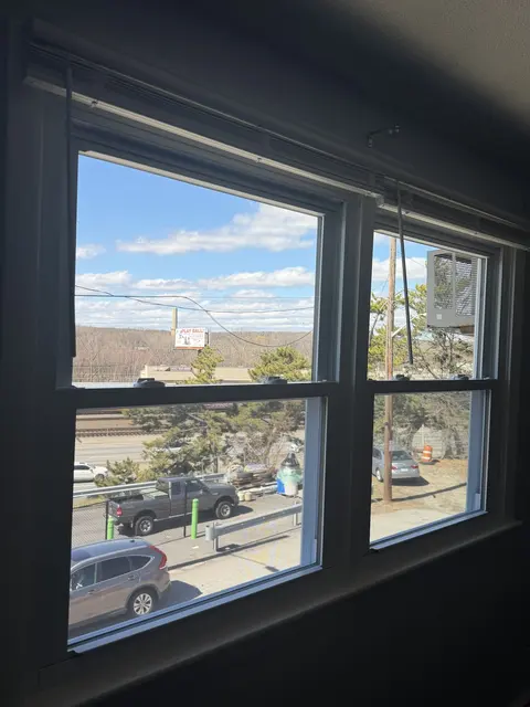 A pair of new white double-hung windows.