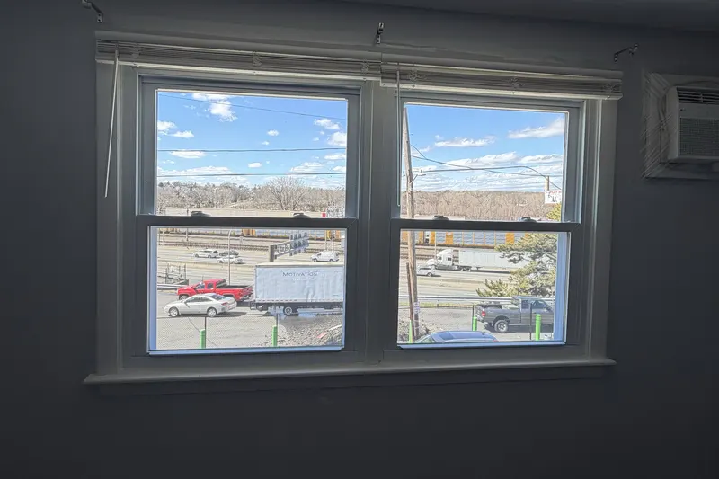 A pair of new white double-hung windows we installed in Pawtucket, RI.